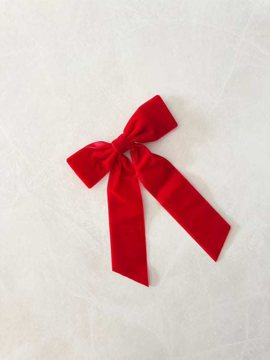 Pince en velours rouge